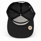 Underside view of the Graffiti Wear black 7-panel snapback showing laser-perforated back panels and sweatband